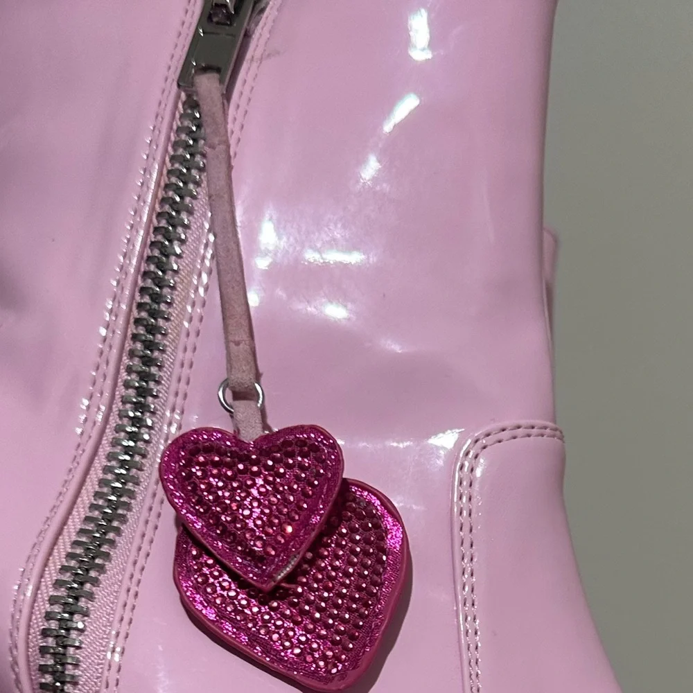 Dolls Kill Glossy Pink Platform Boots with Heart Accents